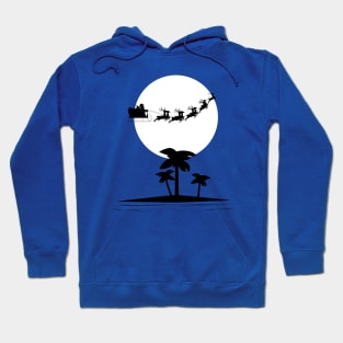 Santa Flying Over a Tropical Island Hoodie